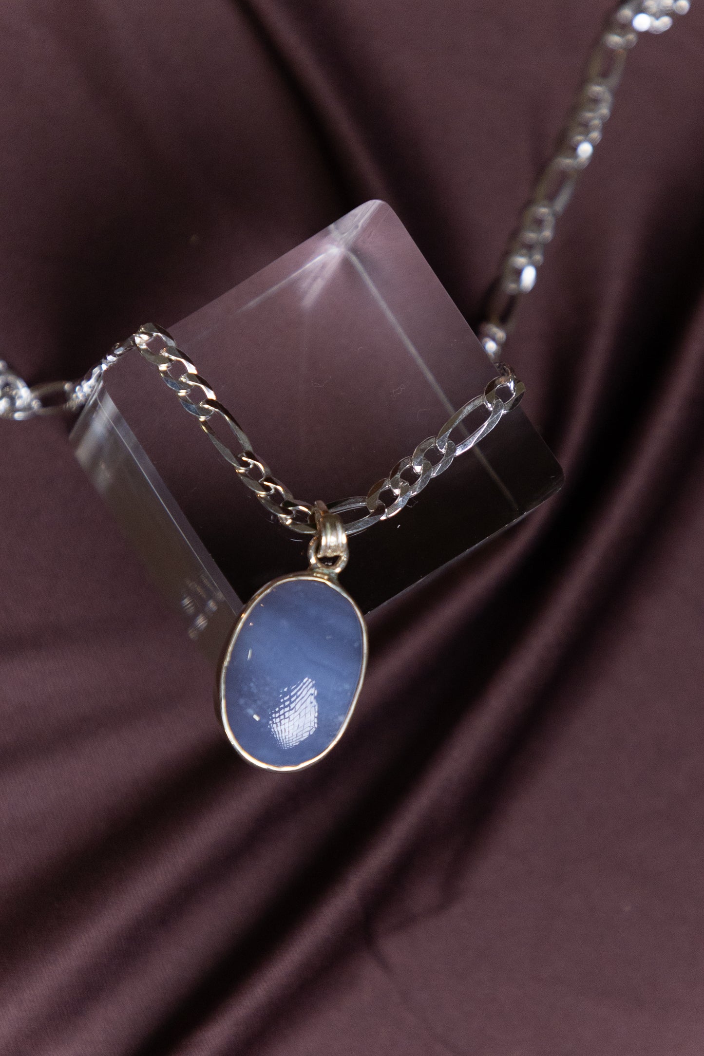 Oval cabochon Blue Chalcedony gemstone Pendant encased in Silver